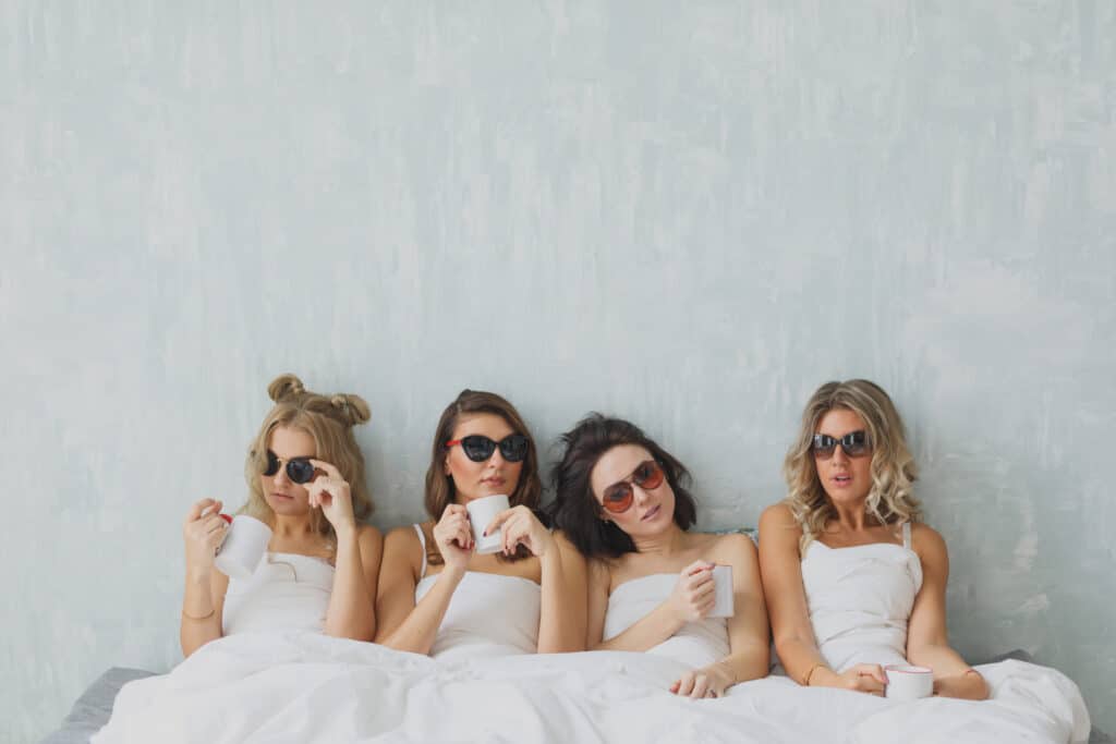 Group,Of,Beautiful,Young,Woman,Napping,In,Her,Bed,After