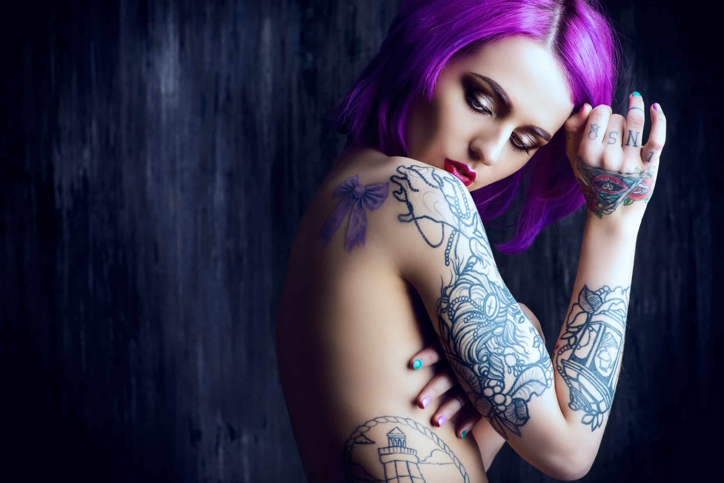 Beautiful,Young,Woman,With,Stylish,Crimson,Hair,And,Tattoo,On